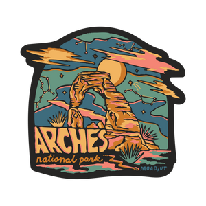 Sticker of Arches National Park with desert landscape and celestial elements.
