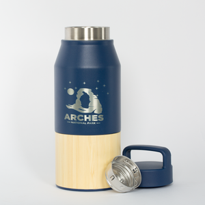Navy and beige insulated bottle with 'Arches National Park' logo on a white background