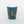 Blue mug with gold graphics and 'MOAB' text on a white background