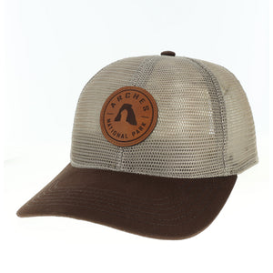 Beige and brown cap with Arches National Park logo on a white background