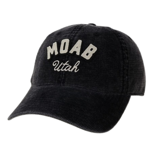 A black corduroy baseball cap featuring 'MOAB Utah' embroidered on the front in cream-colored lettering, shown against a plain white background.