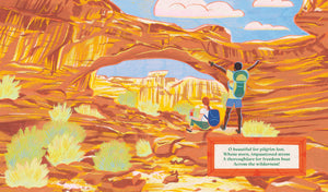 America the Beautiful book open to a red rock arch illustration with hikers