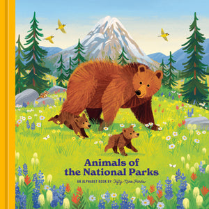Animals of the National Parks alphabet book by Penguin Random House, front cover with a bear and cub in a meadow