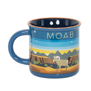 Impact Merchandise Camper Minimalist Mug, a blue enamel style mug with a bighorn sheep and desert scene and Moab lettering