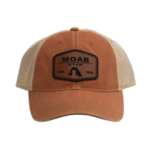 Legacy Old Favorite Trucker Hat in rust orange with a tan mesh back and a Moab Utah Est. 1902 leather patch, front view