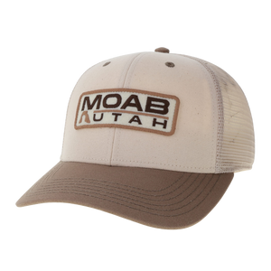 Legacy Stone Clay Mid-Pro Snapback Hat in tan and brown with a Moab Utah patch and mesh back, angled view