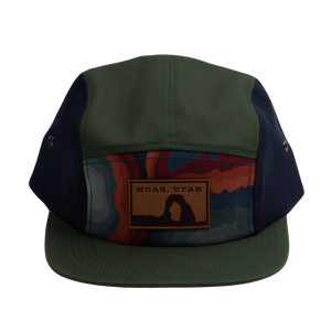 Locale Moab Camper Cap, an olive and navy five panel cap with a retro sunset stripe front panel and Moab Utah patch, front view