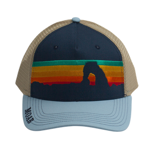 Locale Structured 5 Panel Trucker Cap in navy with a rainbow sunset stripe front, light blue brim and Moab lettering, angled view