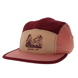 Locale Switchback Packable Camper Hat in maroon and pink with a desert buttes patch and Moab, UT lettering, angled view