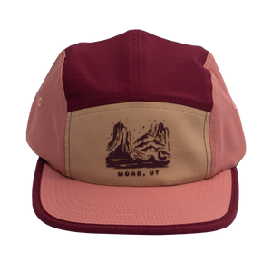Locale Switchback Packable Camper Hat in maroon and pink with a desert buttes patch, front view
