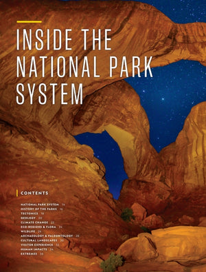 National Geographic Atlas of the National Parks open to the Inside the National Park System chapter with a starry arch photo