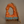 Decorative ornament shaped like Delicate Arch in Moab, Utah on a beige background