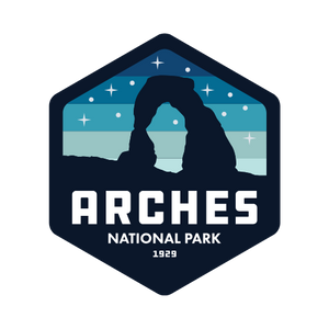 Simply Moab Arches Hexagon Night Sky Sticker, a navy hexagon with Delicate Arch under a starry sky, Arches National Park 1929