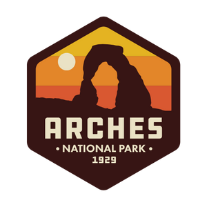 Simply Moab Arches Hexagon Sunrise Sticker, a hexagon with Delicate Arch against orange and red sunrise stripes, Arches National Park 1929
