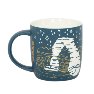 Smith-Western Arches Etched Siren Mug, a navy mug with a white Delicate Arch and starry sky design and Moab lettering